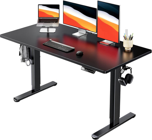 HUANUO Electric Standing Desk, 55" x 28" Whole Piece Desktop, Adjustable Height Computer Desks, 4 Height Memory Settings, Sit Stand Up Desk for Home Office, Black